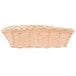 A Tablecraft beige rectangular woven rattan basket with handles.