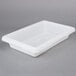 A white Rubbermaid polyethylene food storage container on a gray surface.