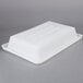 A white Rubbermaid polyethylene food storage container.