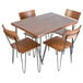 A BFM Seating metal dining height leg set on a table with chairs.