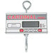 A Cardinal Detecto digital hanging scale with a hook.