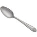 a silver spoon on a white background