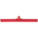 A red plastic Carlisle squeegee with a red handle.