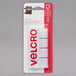 A package of 12 Velcro® white sticky back pads with square fasteners.