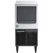 A black rectangular Hoshizaki undercounter ice machine with a stainless steel front.