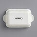 A white rectangular Acopa stoneware casserole dish with black text.