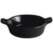 An Acopa Keystone black stoneware mini casserole dish with handles.