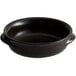 A black bowl with a handle on a white background.