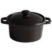 An Acopa Keystone black stoneware mini casserole dish with lid.