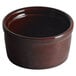 An Acopa Keystone chestnut stoneware ramekin on a table.