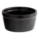 An Acopa Keystone black stoneware ramekin.