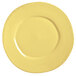 A Libbey Farmhouse yellow porcelain plate with a white rim.