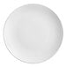 An Acopa matte white stoneware coupe plate with a white border.