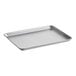 A rectangular aluminum half size sheet pan with a wire-reinforced rim.
