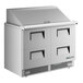 A stainless steel True Mega Top Refrigerated Sandwich Prep Table with 4 drawers.