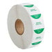 A roll of white and green labels with "Friday" on it.