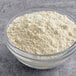 A bowl of yellow cake mix powder.
