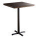 A Lancaster Table & Seating square table with a wooden top and black base.
