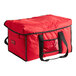 A red Cambro insulated delivery bag with black straps.