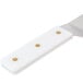 A white spatula with a white handle.