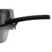 A Vollrath stainless steel Spoodle with a black handle on a metal tray.