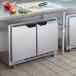 A Beverage-Air stainless steel undercounter refrigerator with a vegetable drawer.