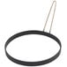 A black metal egg omelet ring with a long thin metal handle.