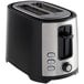 A black and silver Hamilton Beach toaster with a handle.