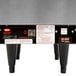 A Hatco booster water heater with a switch on the back.