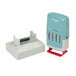 A rectangular white Xstamper VersaDater with blue and red labels.