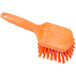 An orange Carlisle Sparta pot scrub brush with a handle.