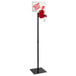 A white and red Garvey My Turn take-a-number dispenser with a red sign.