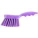 A purple Carlisle Sparta pot scrub brush with a handle.