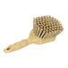 A Carlisle Sparta tan pot scrub brush with a wooden handle.