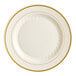 A white plate with a gold rim.