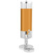 An Eastern Tabletop stainless steel beverage dispenser with an acrylic container filled with orange liquid and ice.