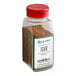 A clear container of brown Regal Ground Cloves.