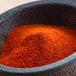 a bowl of red powder