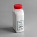 A white plastic container of Regal Arrowroot Powder with a red label and lid.