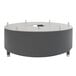 A round stainless steel chafer alternative with a hole in the middle on a table.