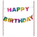 A white pole with a rainbow "Happy Birthday" banner.