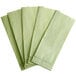 A pack of five green and white Hoover vacuum bags.