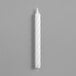 A white candle on a gray surface.