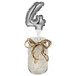 A jar with a silver "4" balloon cake topper.