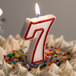 a white cake with a number on it
