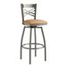 A Lancaster Table & Seating clear coat finish cross back swivel bar stool with a light brown vinyl cushion.