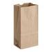 A brown paper bag with a black logo.