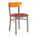A Lancaster Table & Seating metal chair with burgundy vinyl seat and cherry wood back.
