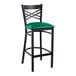 A Lancaster Table & Seating black cross back bar stool with a green vinyl padded seat.