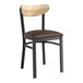 A Lancaster Table & Seating black chair with dark brown vinyl seat and driftwood back.